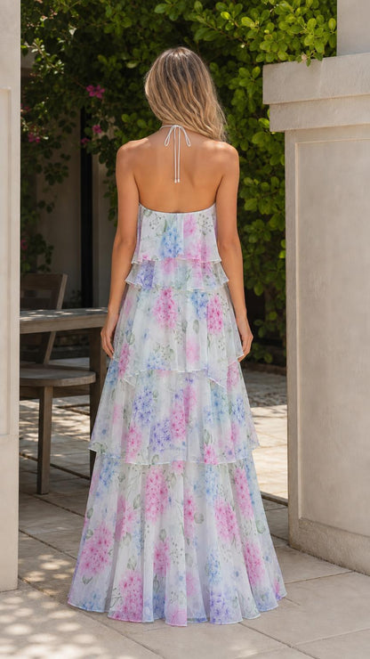 Back view showing halter neck ties on white multi floral maxi dress
