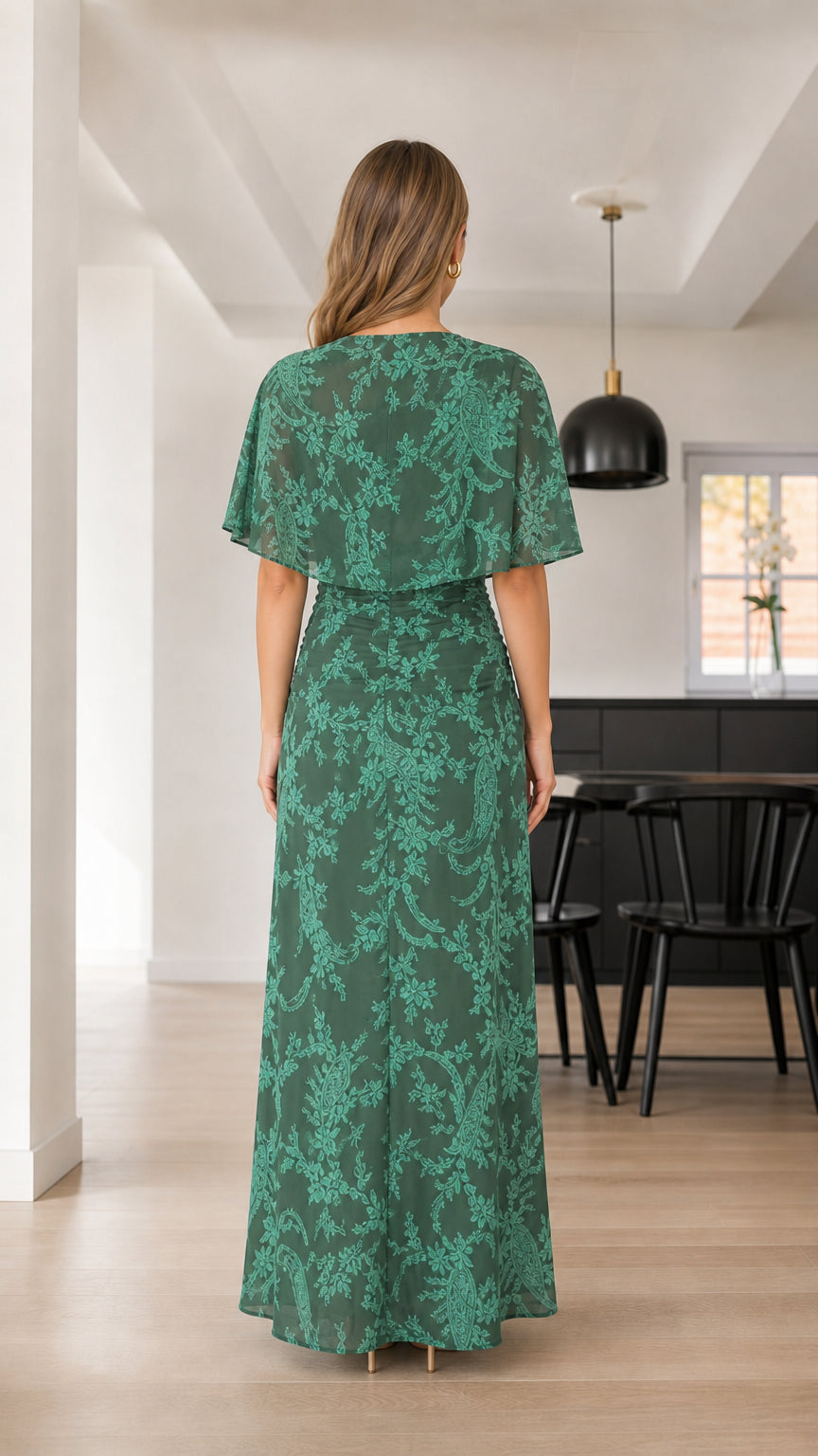 Back view of Forest Green maxi dress highlighting draped capelet design