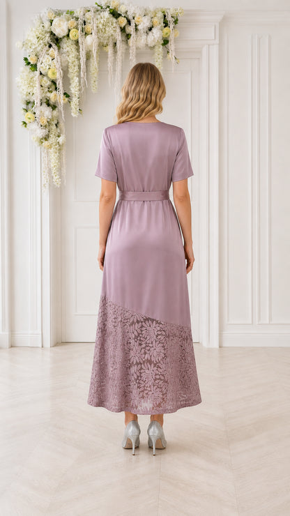 Model wearing mauve lace-trimmed midi dress, back view