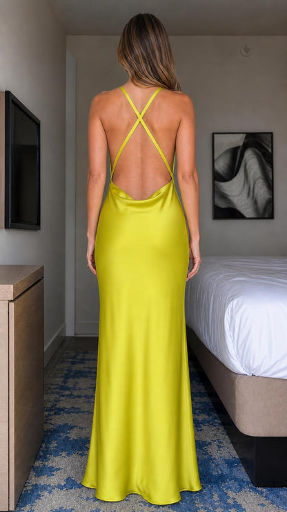 Back view showing criss-cross straps on chartreuse evening gown