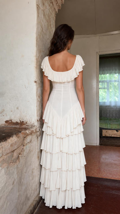 Back view of model showing tiered ruffle back design