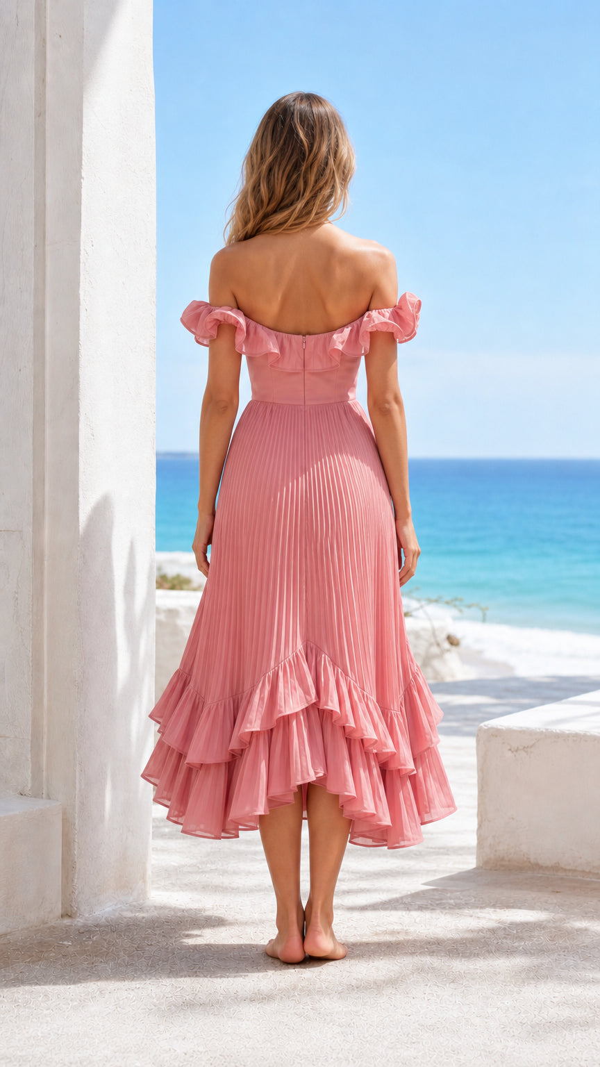Back view of model wearing pink off-shoulder pleated dress