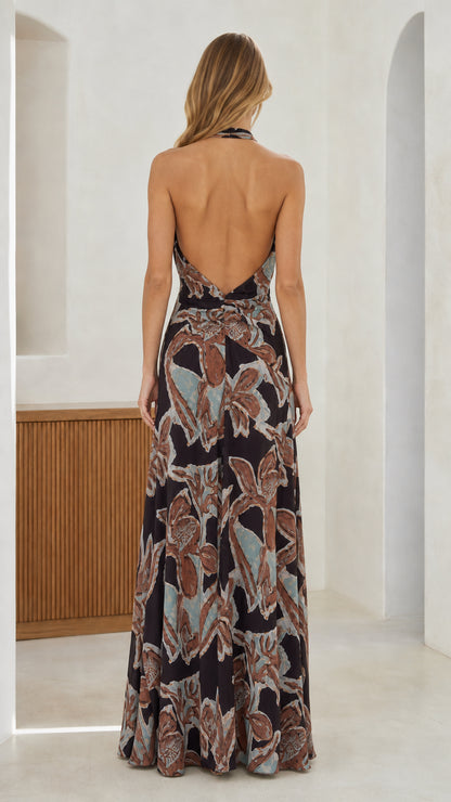 Back view showcasing open back design of the black maxi dress