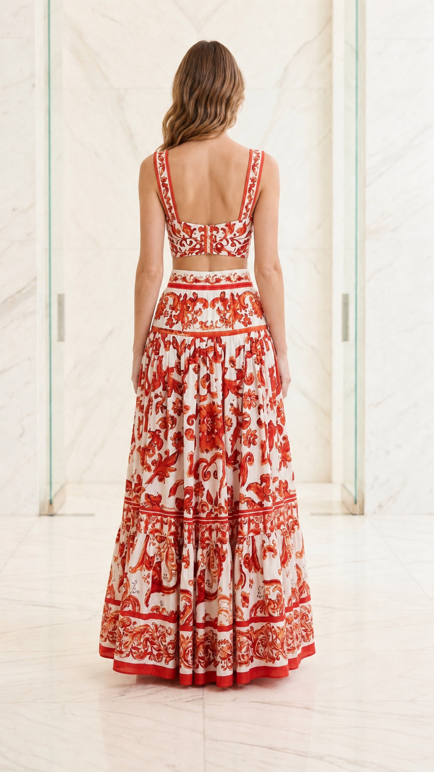 Back view of woman wearing red and white two-piece set