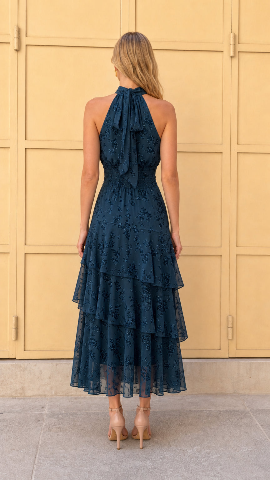 Back view of Dark Teal tiered halter midi dress showcasing neck tie