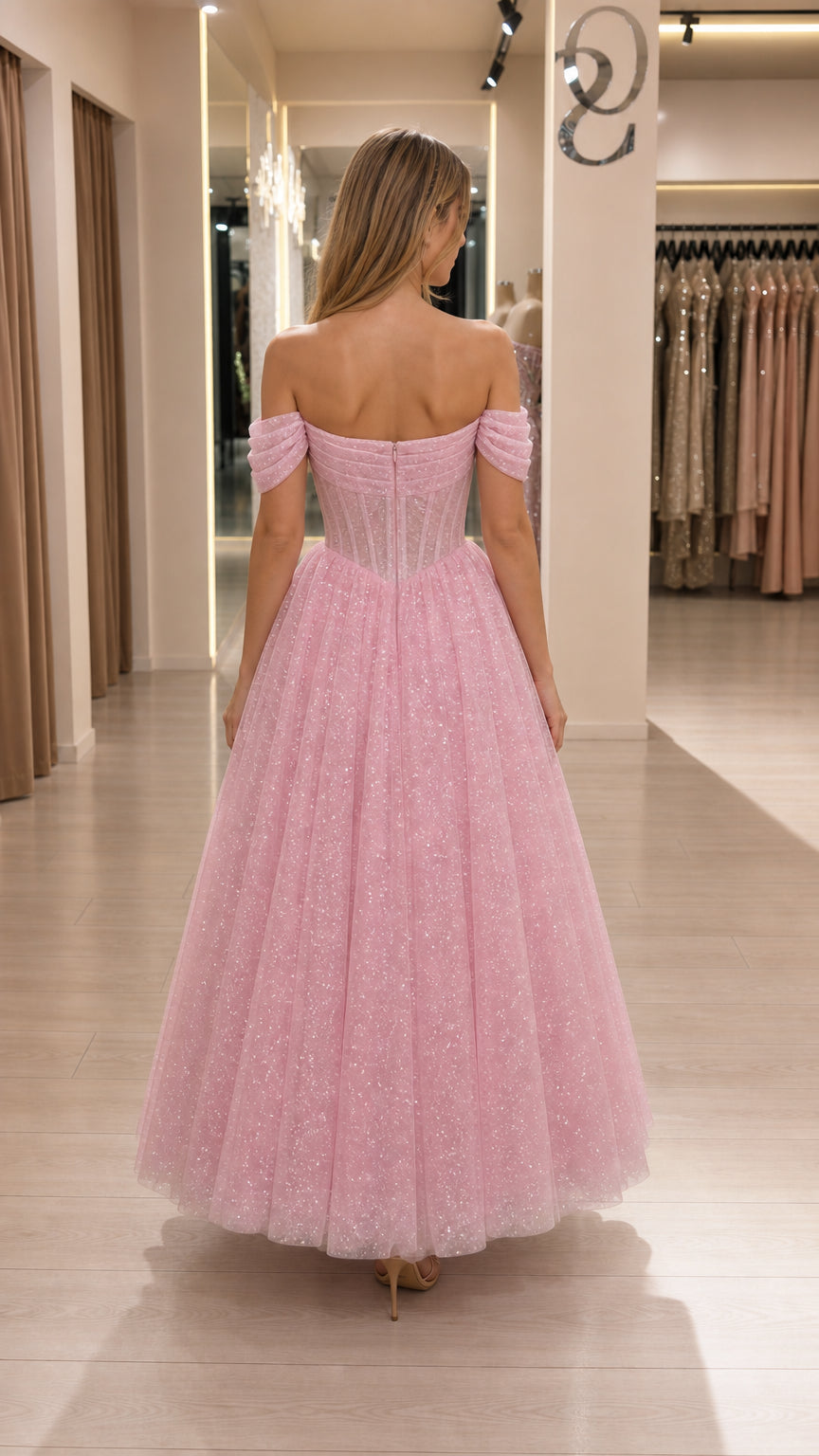 Back view showing structured corset details of pink midi dress