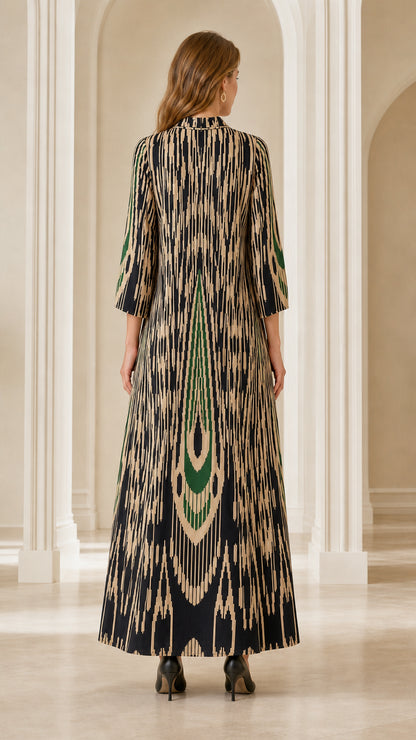 Back full-length view of woman wearing Black Ikat Print Embellished Maxi Dress