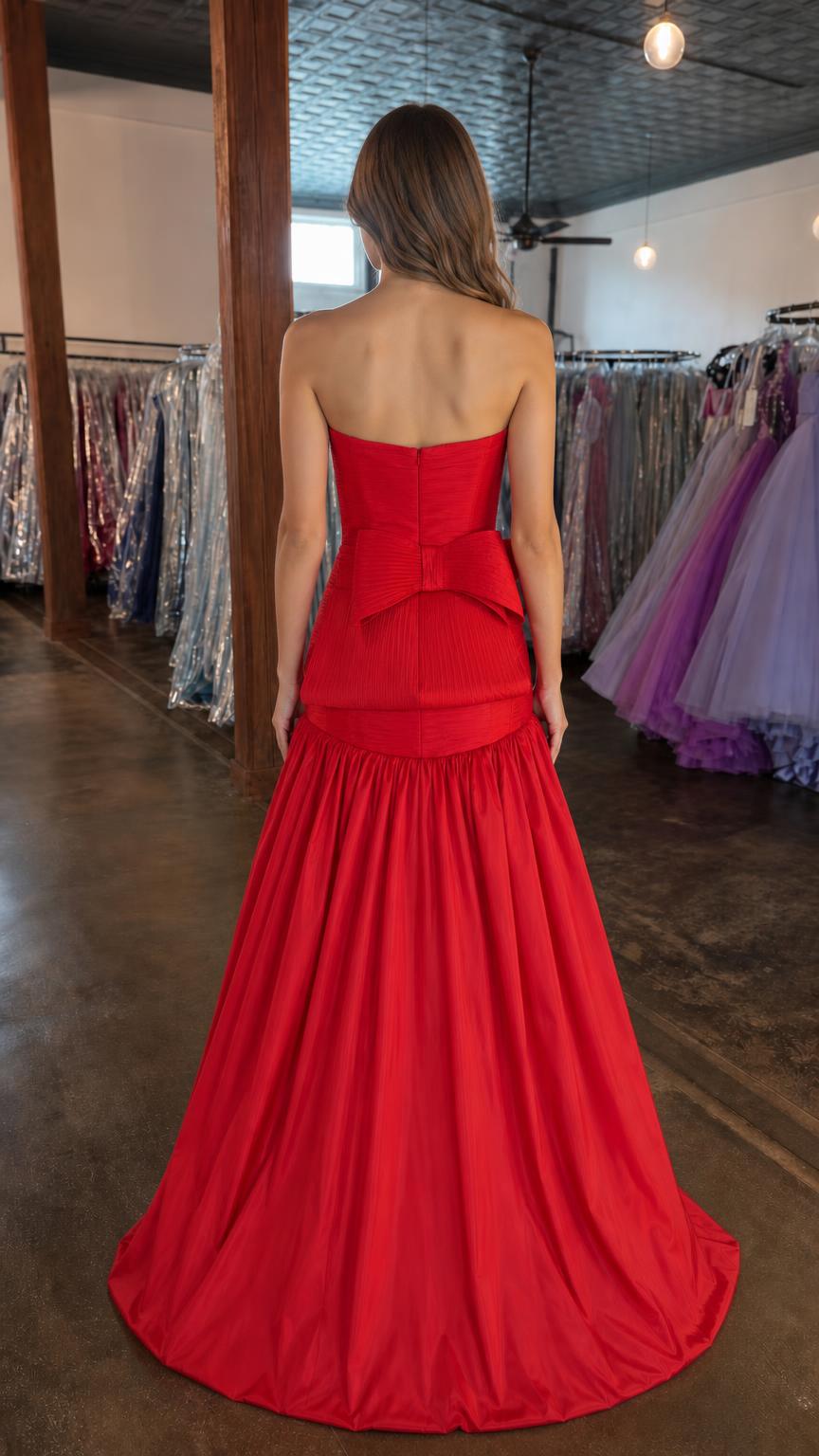 Back view of red evening gown with bow detail