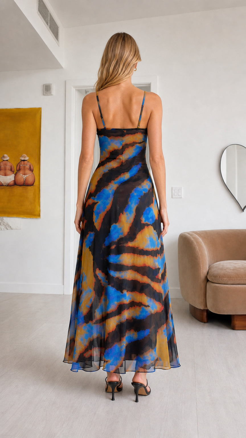 Back view of model showing straight backline and spaghetti straps of Black Multi chiffon set