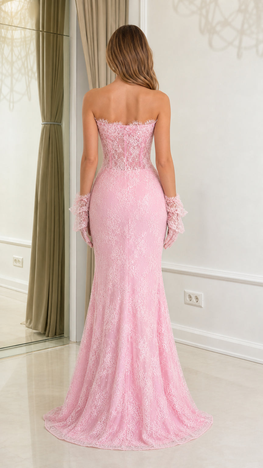Back view of pink strapless lace mermaid evening gown