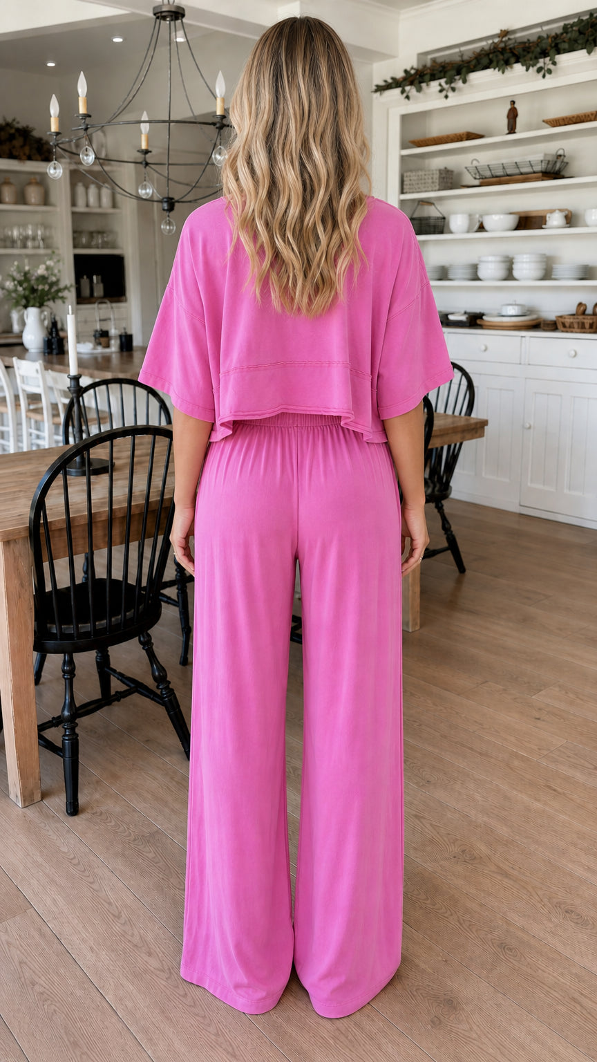 Back view of fuchsia cropped top and wide leg pants set