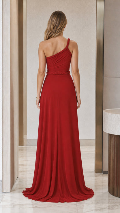 Back view of model in red evening gown showing train