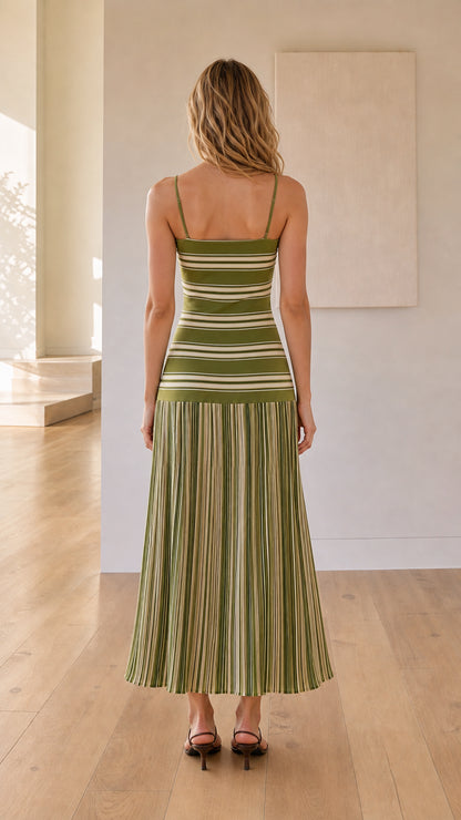 Woman wearing olive green striped knit maxi dress back view