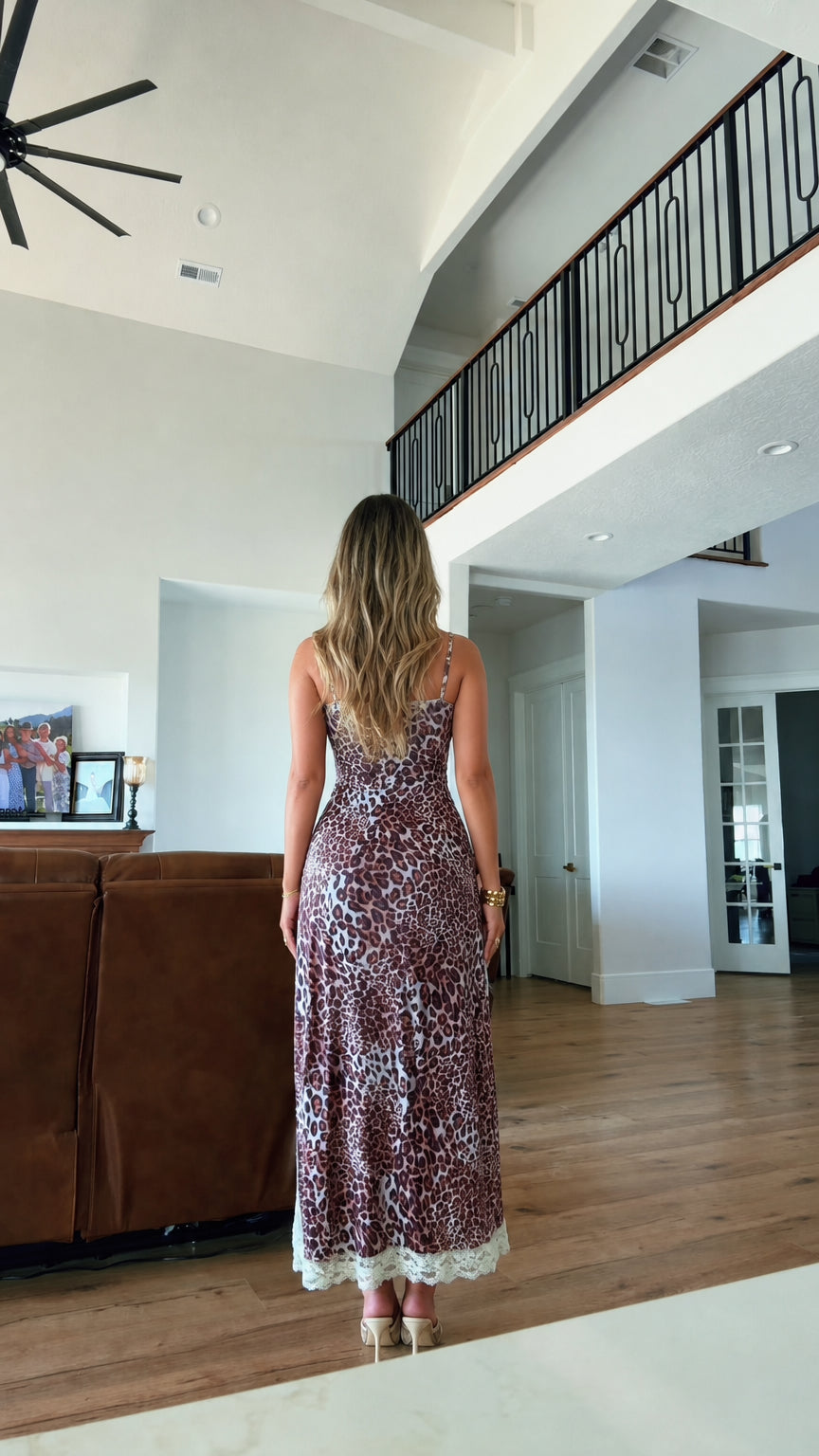 Back view of model in leopard print maxi dress