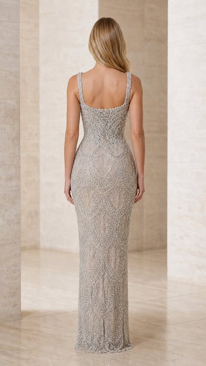 Back view of model in Silver beaded sleeveless formal maxi dress