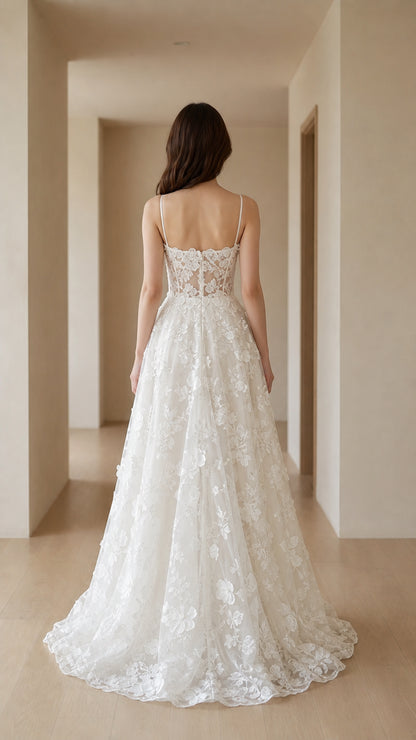 Back view of White evening dress showing sheer bodice