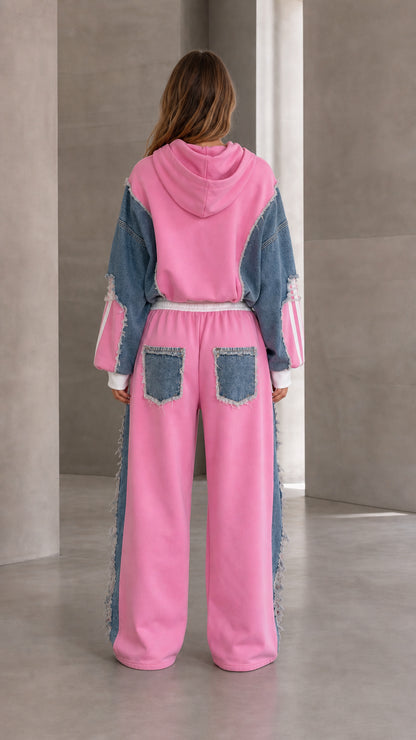 Back view of pink denim patchwork hoodie and wide leg pants with denim back pockets