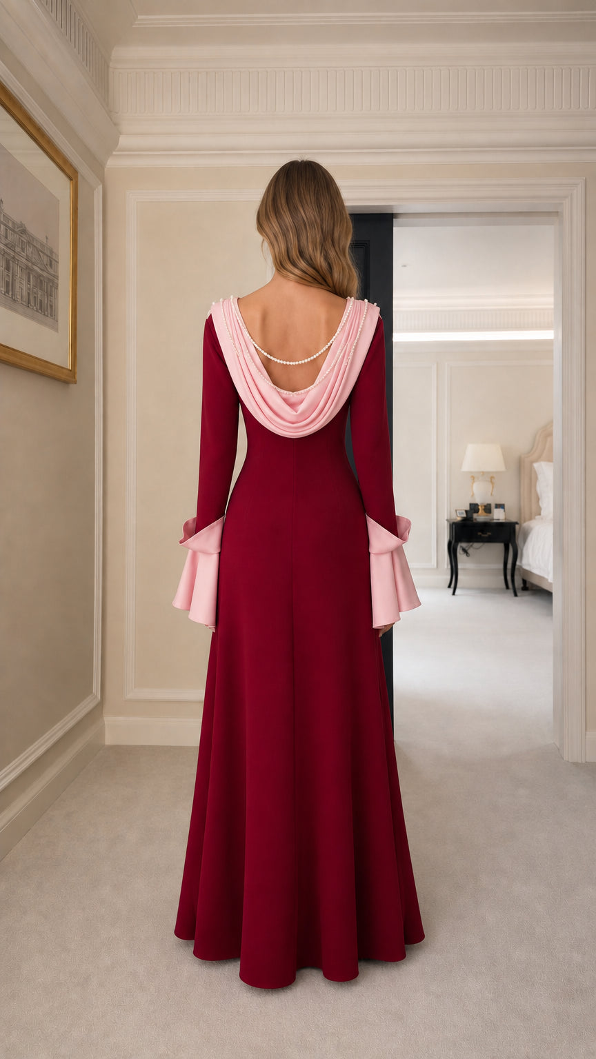 Back view showing draped cowl detail on evening dress