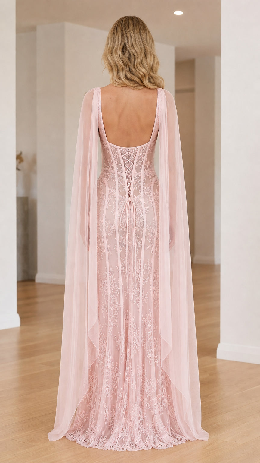 Back view showcasing the lace-up detail and cape