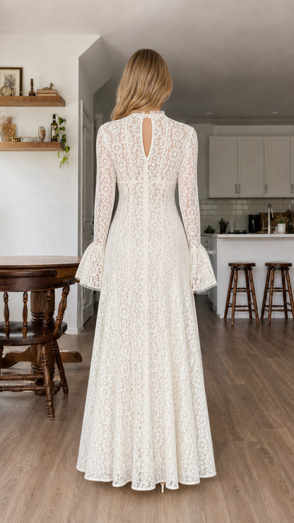 Back view of model in white lace maxi dress with keyhole detail