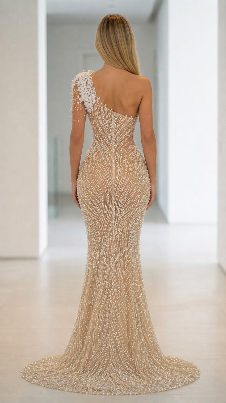 Back view of Champagne formal gown showing fitted silhouette and train