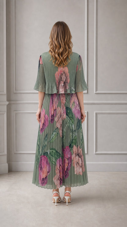 Back view of model wearing sage green floral print plissé maxi dress