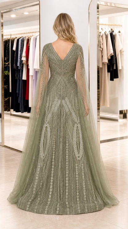 Back view of sage green embellished floor-length gown with V-back