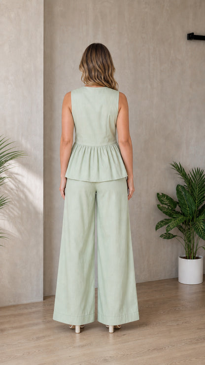 Back view of woman wearing sage green matching set