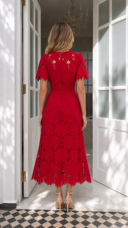 Back view of red lace midi dress showcasing fitted bodice and midi length