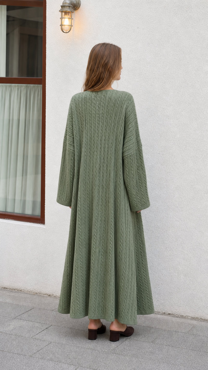 Back view of model wearing Sage Green longline knit duster cardigan and maxi dress