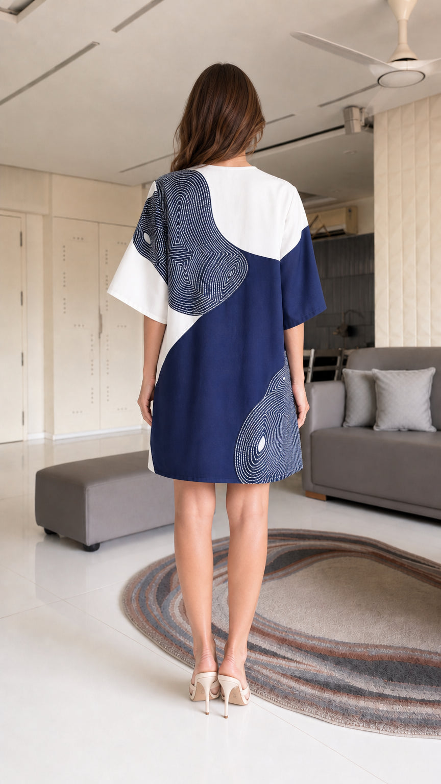 Back view of blue color-block dress with stitching details