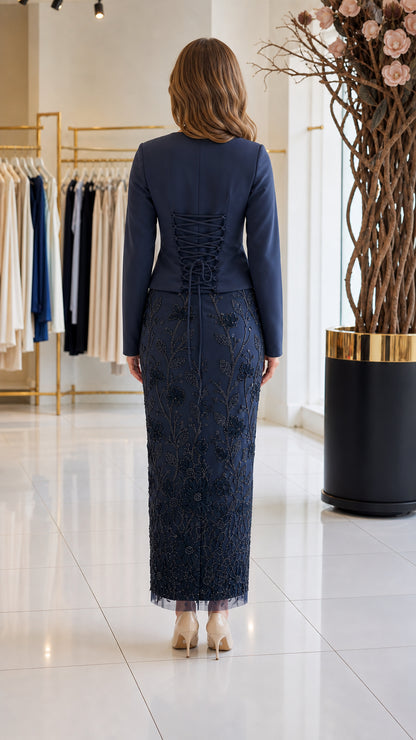 Back view of navy blue formal dress highlighting lace-up corset detail