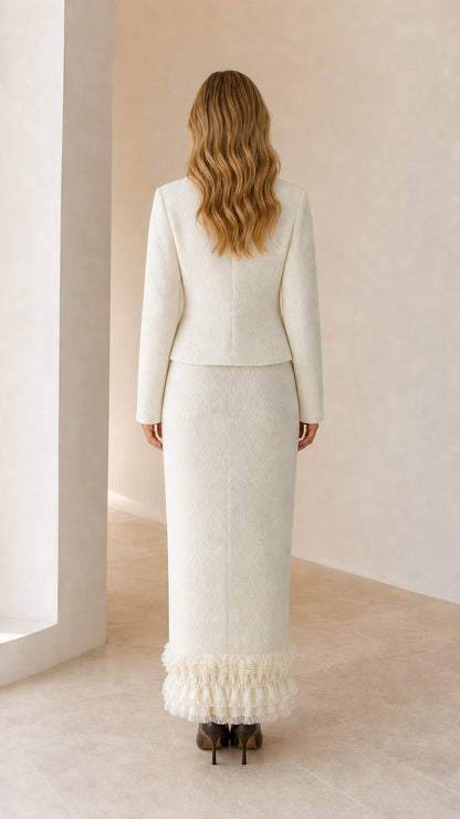 Model wearing white tweed set from the back view