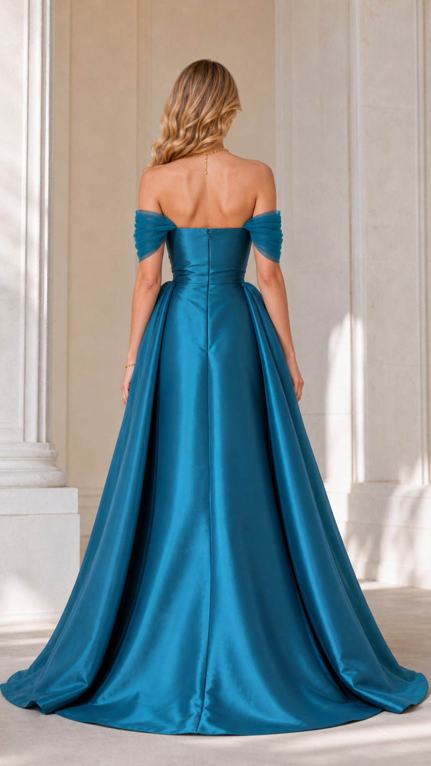 Back view of teal formal gown showing sweep train