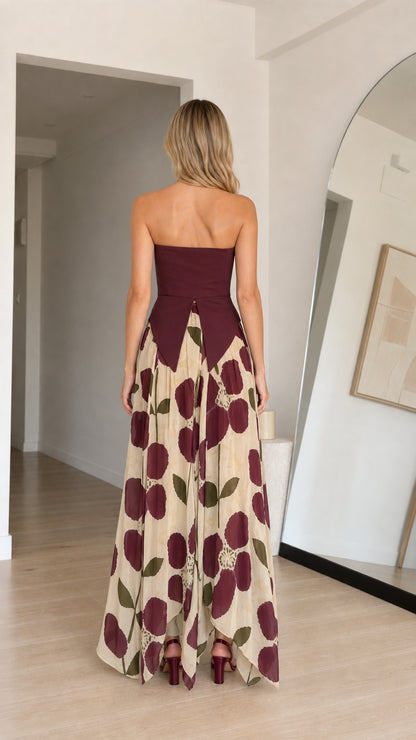 Back view of model showing back detail of burgundy floral maxi dress
