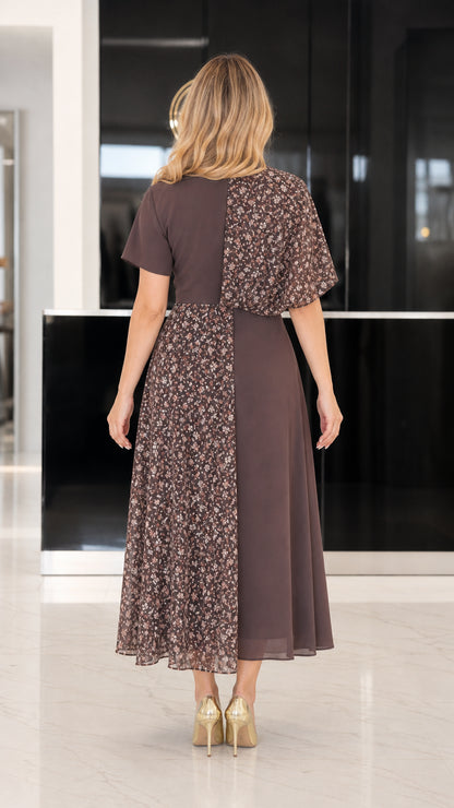Back view of woman wearing mocha brown floral patchwork A-line midi dress