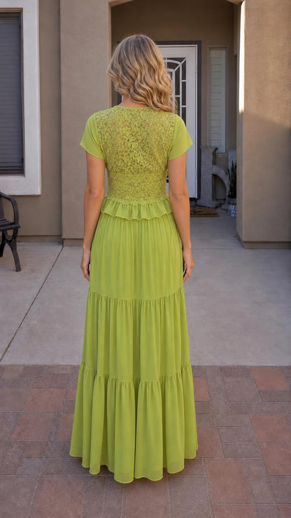 Back view of green maxi dress showing lace back detail
