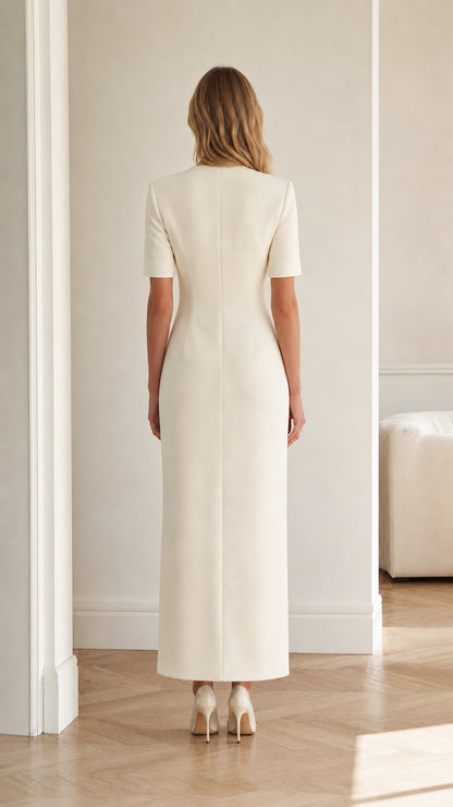 Back full view of ivory fitted column maxi dress with clean tailored seams