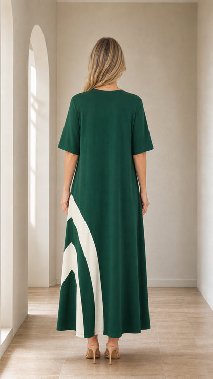 Back view of woman in Forest Green maxi dress