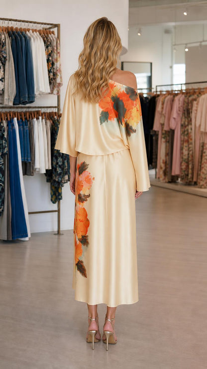 Back view of champagne midi dress showcasing drape