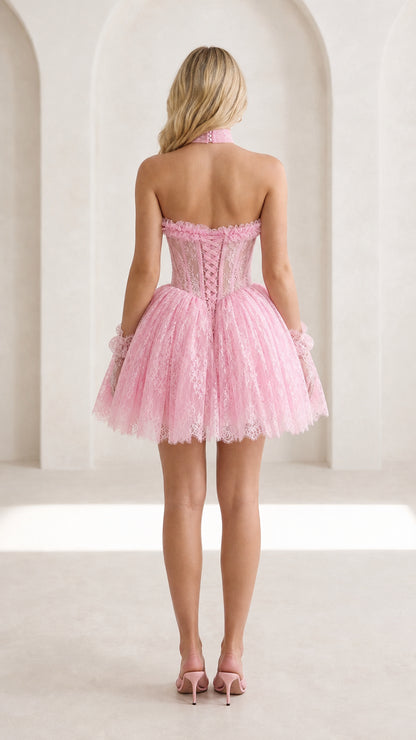 Back view of pink lace corset mini dress showing lace-up detail