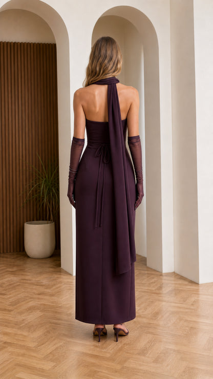 Back view showing draped scarf detail on burgundy dress