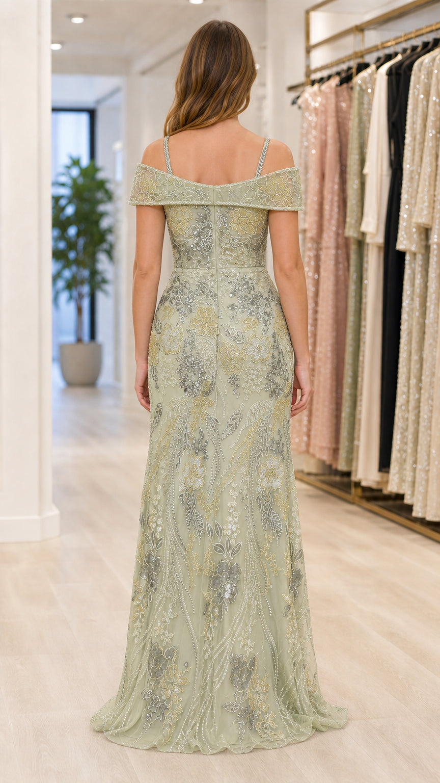 Sage green off-shoulder evening gown shown from the back with slim straps and flared hem