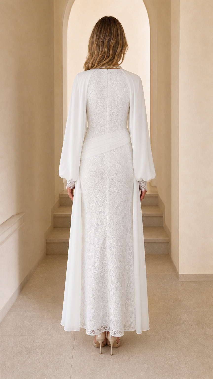 Back view of woman in white lace maxi dress