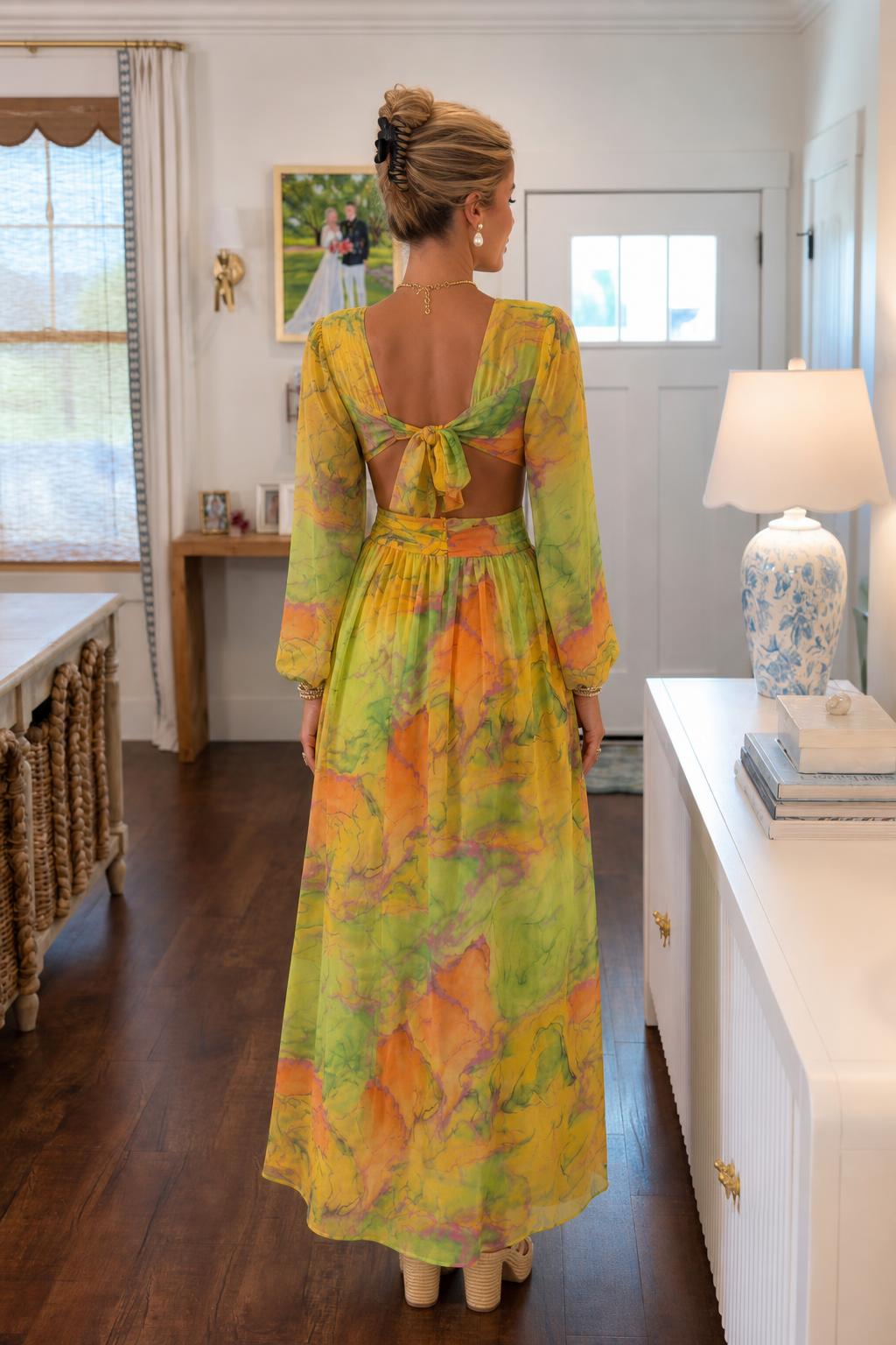 Back view showing tie-back detail on yellow multi dress