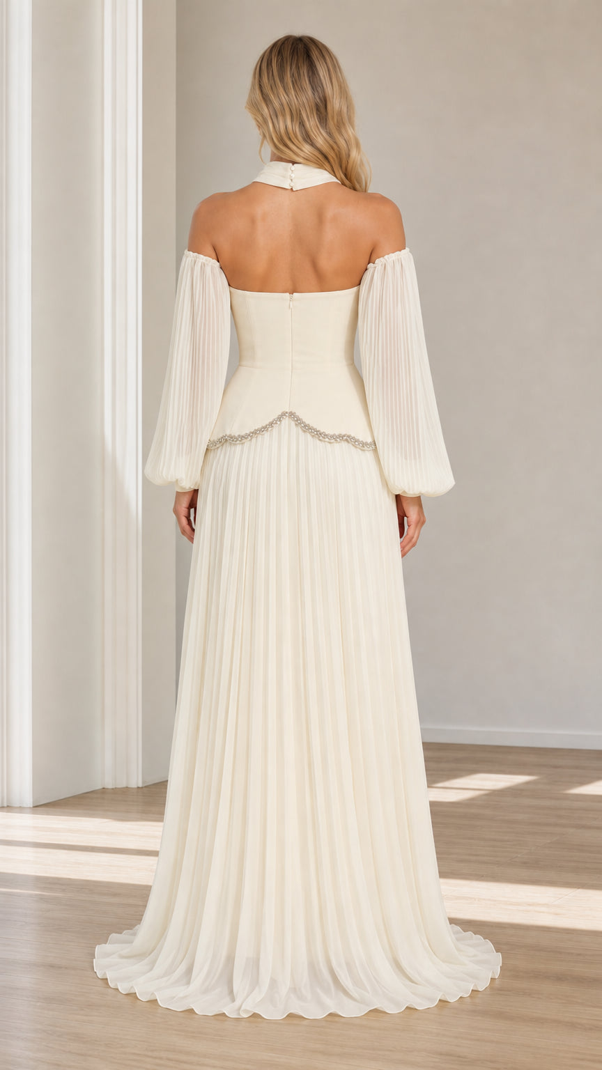 Back view of model in ivory choker off-the-shoulder pleated evening gown