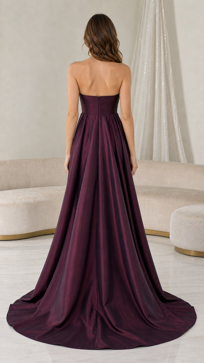 Back view of formal dress showing long train and clean lines