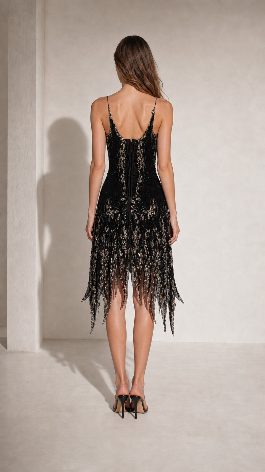 Back view of Black beaded fringed midi dress