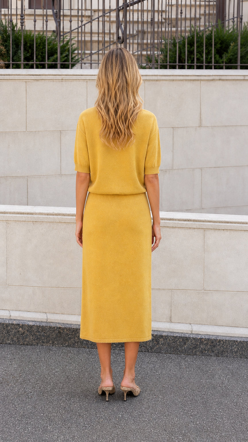 Mustard knit midi dress shown from the back with a straight midi skirt