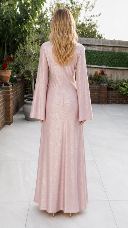 Back view of model in pink maxi dress
